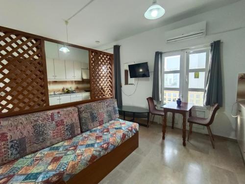 TV a/nebo společenská místnost v ubytování Albatross Apartments