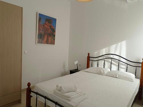 Postel nebo postele na pokoji v ubytování Albatross Apartments
