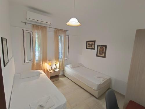 Postel nebo postele na pokoji v ubytování Albatross Apartments