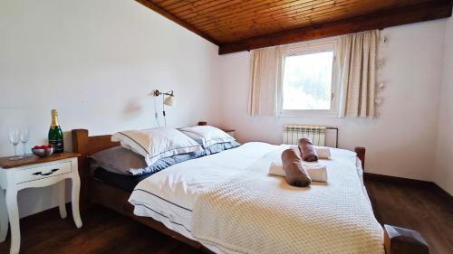 Postel nebo postele na pokoji v ubytování Chata West Spazio