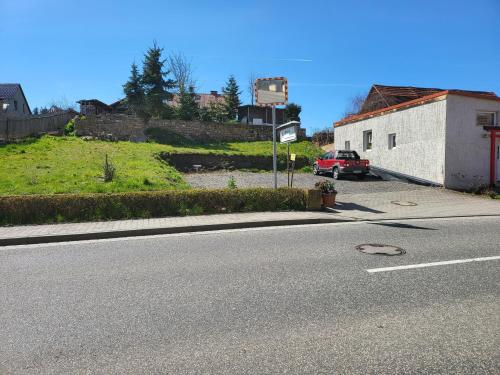 a car parked on the side of a road at Ferienhaus Triasland in Donndorf