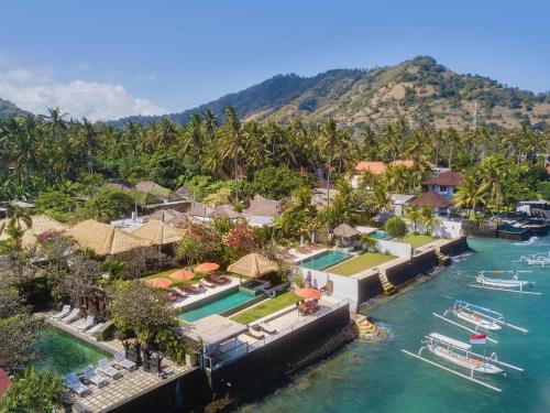an aerial view of a resort on the water at Villa Kaniksa in Candidasa