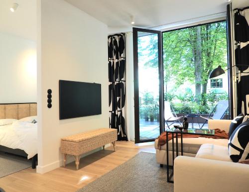 Ένα ή περισσότερα κρεβάτια σε δωμάτιο στο IKIGAI APARTMENT ŚWINOUJŚCIE