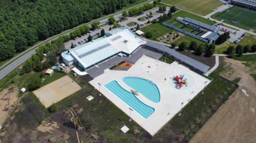 an overhead view of a large building with a swimming pool at Apartments Dora Sveti Martin na Muri in Sveti Martin na Muri