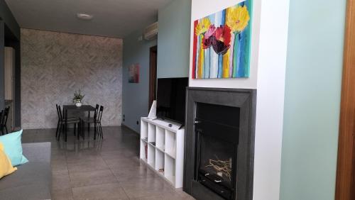 Televisyen dan/atau pusat hiburan di Casa Lamberti B&B