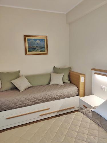a couch with pillows on it in a room at CasalPiano in Orvieto