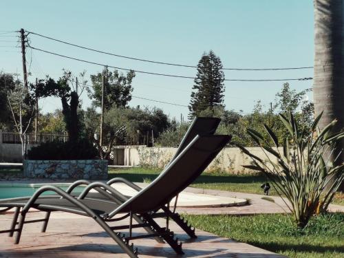 Κήπος έξω από το Villa Elea Apartments
