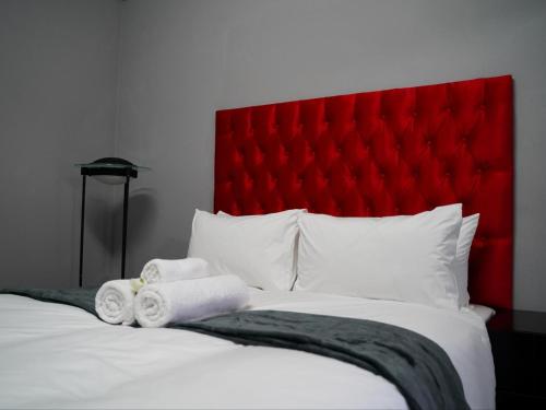 Katil atau katil-katil dalam bilik di Aqua Guest House
