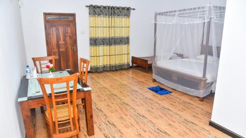 Postel nebo postele na pokoji v ubytování Nature Royal Resort
