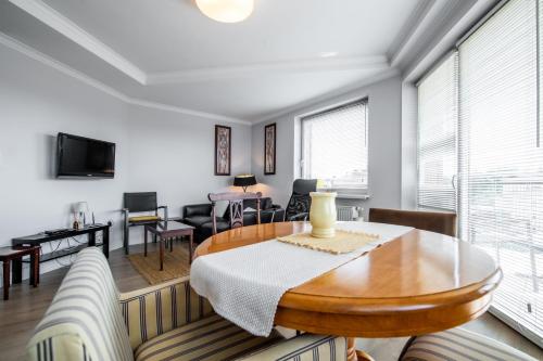 TV a/nebo společenská místnost v ubytování Apartament Szafirowy