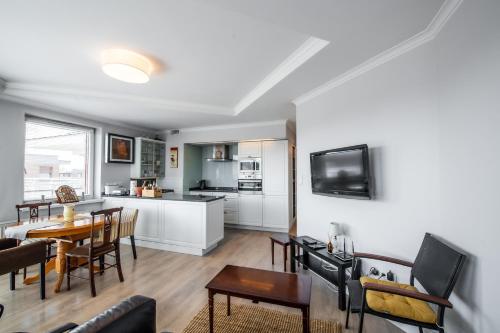 Kuchyň nebo kuchyňský kout v ubytování Apartament Szafirowy