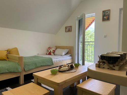 Postel nebo postele na pokoji v ubytování Wolf Apartments