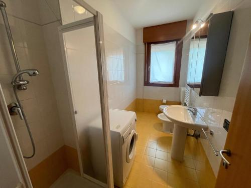 TV a/nebo společenská místnost v ubytování Residence Roberta con piscina - Agenzia Cocal