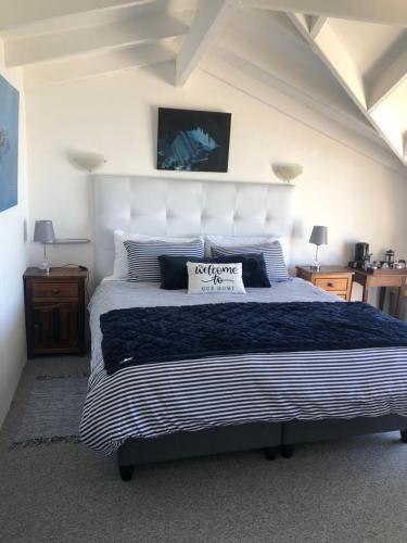 Postel nebo postele na pokoji v ubytování Ollava Guesthouse