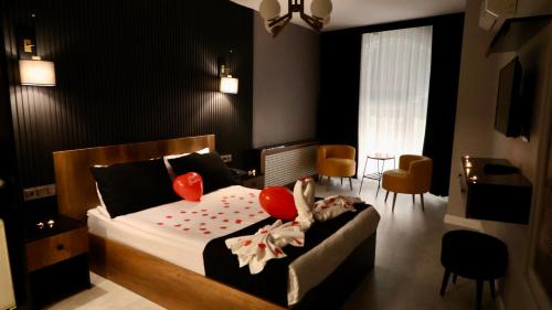 Ένα ή περισσότερα κρεβάτια σε δωμάτιο στο işbilir hotel