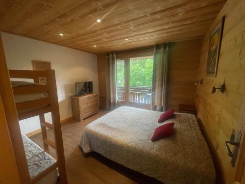 Tempat tidur dalam kamar di Aravis Locations