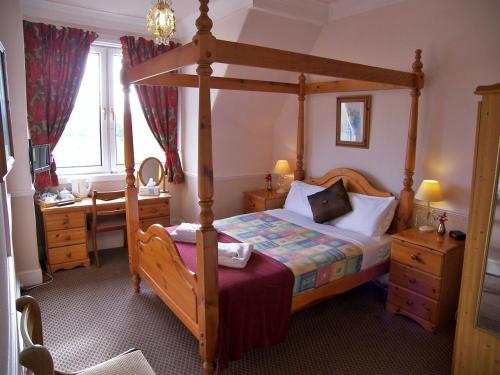Кровать или кровати в номере Ardleigh House