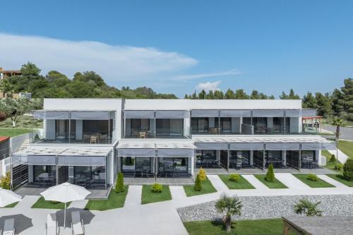 an aerial view of a large white building at Sani Gulf I & II in Sani Beach