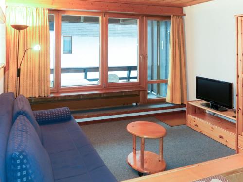 Μια τηλεόραση ή/και κέντρο ψυχαγωγίας στο Studio Résidence Dixence-3 by Interhome