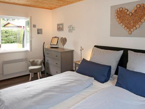 Ένα ή περισσότερα κρεβάτια σε δωμάτιο στο Holiday Home Caro by Interhome