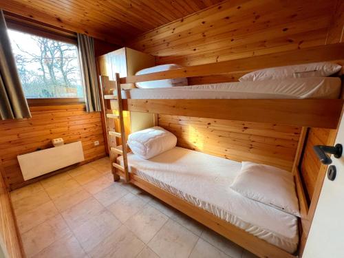 Postel nebo postele na pokoji v ubytování Le Bochetay 13