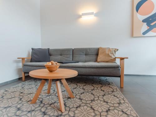Posezení v ubytování Apartment Das Georgen- Großglockner-Kitzsteinhorn by Interhome