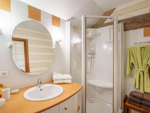 a bathroom with a sink and a shower at Holiday Home La Haute Gilberdière-2 by Interhome in Sartilly