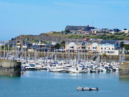 a bunch of boats are docked in a harbor at Holiday Home La Haute Gilberdière-2 by Interhome in Sartilly