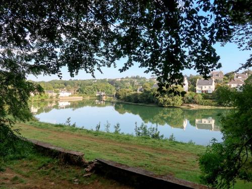 a view of a lake in a park at Holiday Home La douce Trégoroise by Interhome in Tréguier
