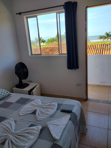 Postel nebo postele na pokoji v ubytování Pousada Beach Porto Novo