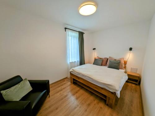 Posteľ alebo postele v izbe v ubytovaní Rodinné apartmány Dobrné