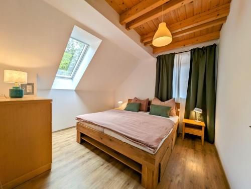 Posteľ alebo postele v izbe v ubytovaní Rodinné apartmány Dobrné