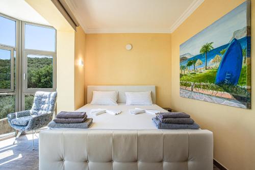 Ένα ή περισσότερα κρεβάτια σε δωμάτιο στο Naruto Villas