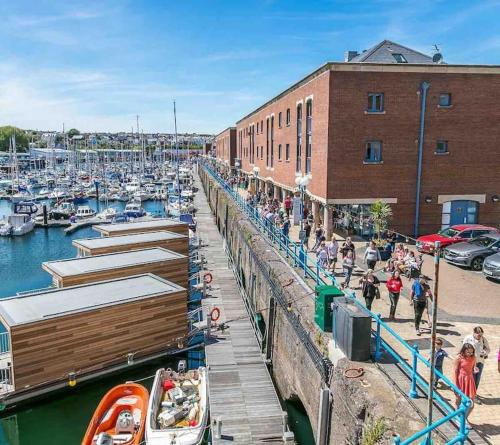 a group of boats docked in a marina at Quaint cottage close to Marina in Pembrokeshire