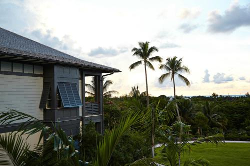 a house with a solar panel on the side of it at The Island House in Nassau