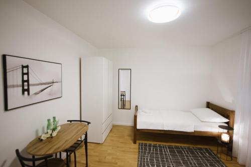 Ένα ή περισσότερα κρεβάτια σε δωμάτιο στο Apartman Fidelis