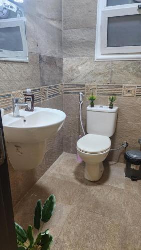 Koupelna v ubytování Madinaty apartment 1 شقة فندقية مفروشة سوبر لوكس في مدينتي