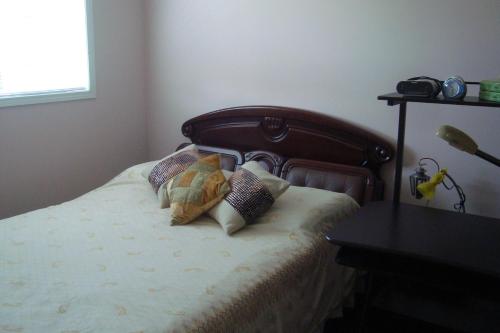 Una cama o camas en una habitación de HB Guest Home 3