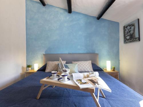 Ένα ή περισσότερα κρεβάτια σε δωμάτιο στο Holiday Home Capriccioli A by Interhome
