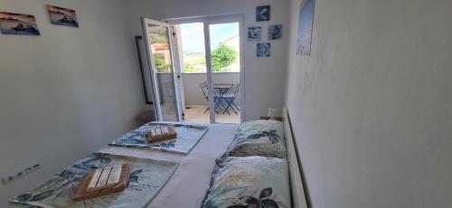 Ένα ή περισσότερα κρεβάτια σε δωμάτιο στο Apartman Belisima Deluxe