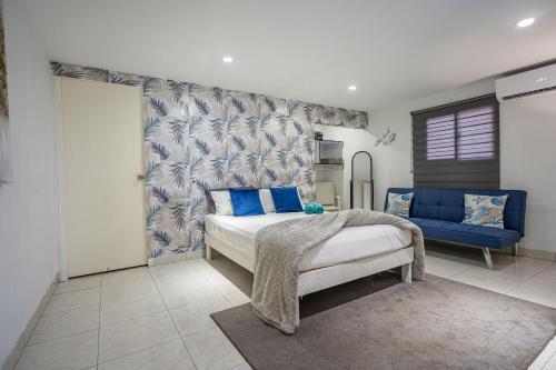 Giường trong phòng chung tại Peace vacation rental aruba