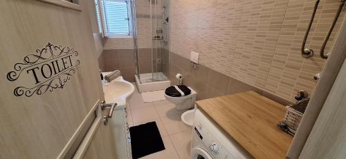 Ένα μπάνιο στο Apartman Belisima Deluxe