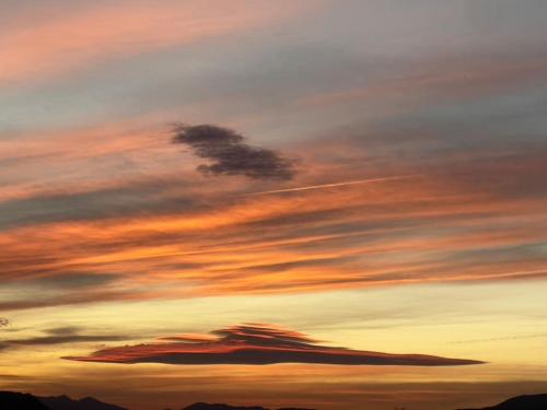 a sunset with a cloud formation in the sky at Attic La Mirada - Bonalba Golf in Mutxamel