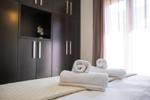 Postel nebo postele na pokoji v ubytování Livas Relaxing Villas in Kardamena