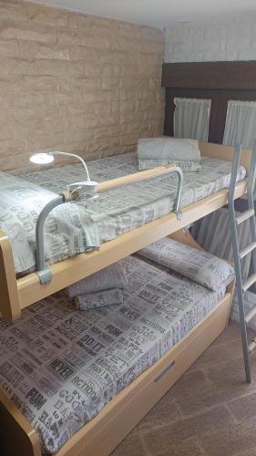 two bunk beds sitting on top of each other at El Cuchitril in Almería