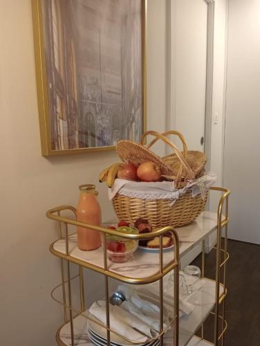 a basket of fruit on a shelf in a room at 262 Boutique Aliados in Porto