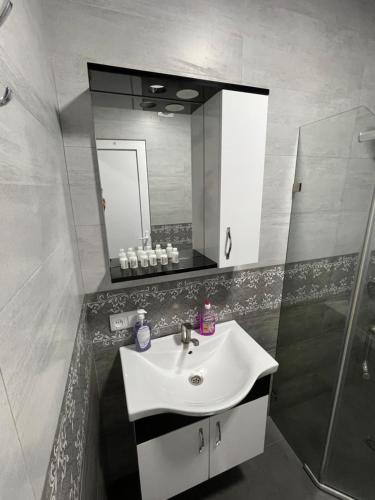 Koupelna v ubytování TEO BEACH APARTAMENT