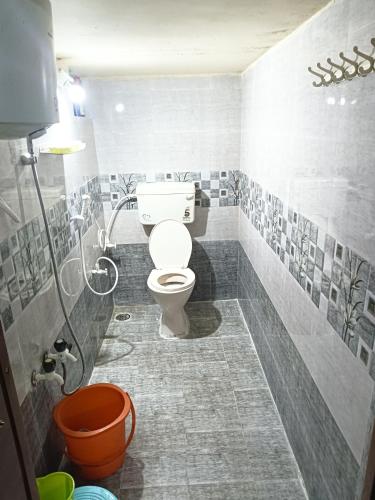 Ein Badezimmer in der Unterkunft Siddharth Homestay