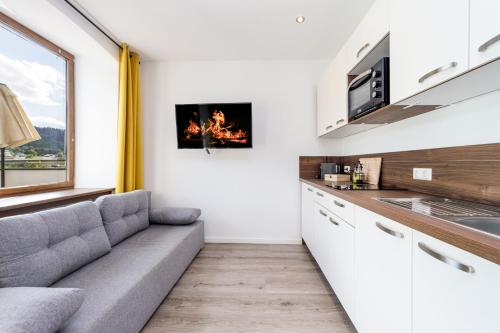 Η κουζίνα ή μικρή κουζίνα στο VonMos Moselblick Apartments