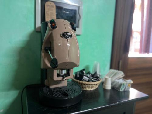 a brown coffee maker sitting on a counter at Marnabianca Apartment in Realmonte